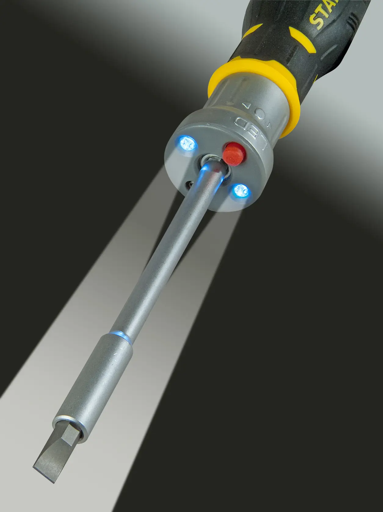 STANLEY FMHT0-62689 screwdriver with built-in LED lights, close-up angle highlighting illuminated tip.