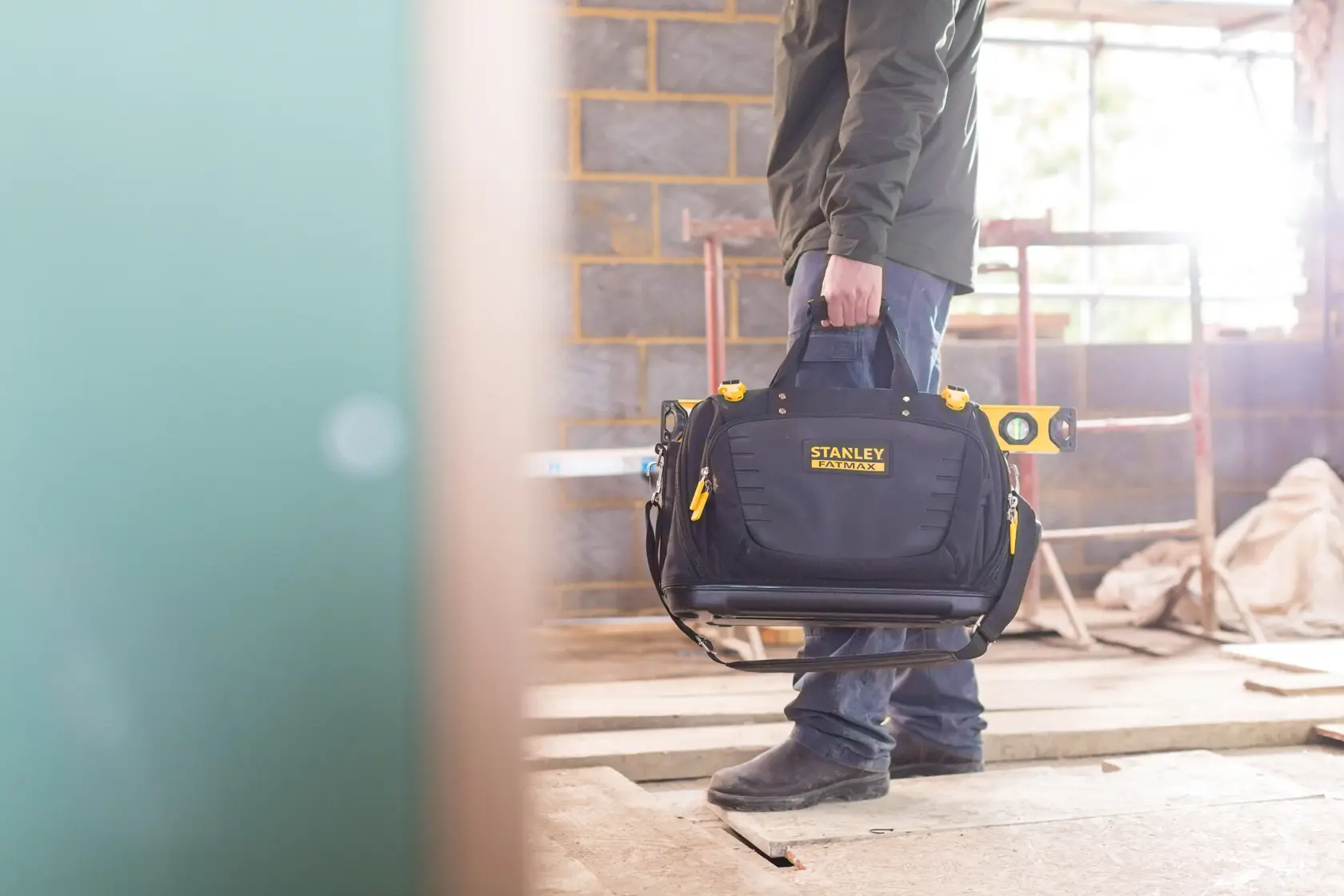 Photo of STANLEY FMST1-80147 tool bag carried on construction site.