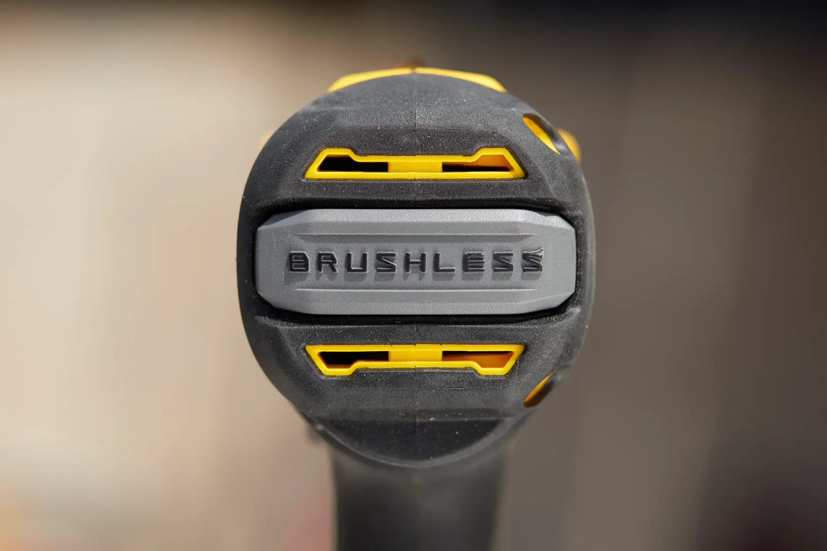 STANLEY SFMCD715D2K brushless drill close-up, yellow and black details, photography.